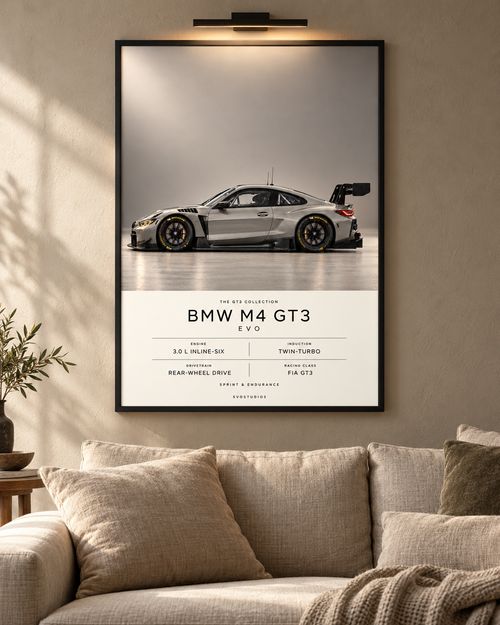 BMW M4 GT3 EVO — GT3 Studio Edition in a black Classic frame above a neutral sofa with warm picture lighting