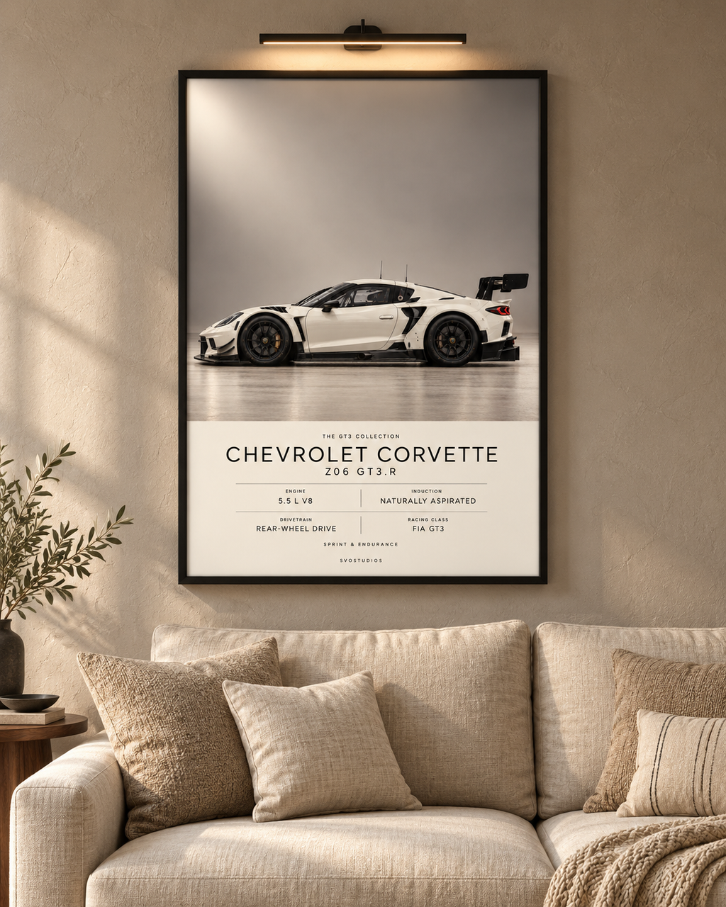 Chevrolet Corvette Z06 GT3.R — GT3 Studio Edition in a black Classic frame above a neutral sofa with warm picture lighting