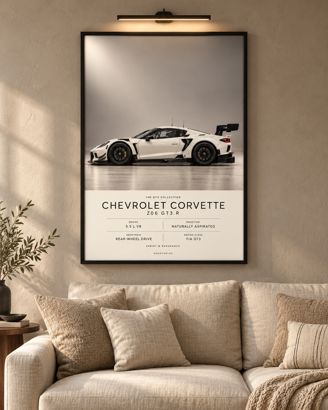 Chevrolet Corvette Z06 GT3.R — GT3 Studio Edition in a black Classic frame above a neutral sofa with warm picture lighting