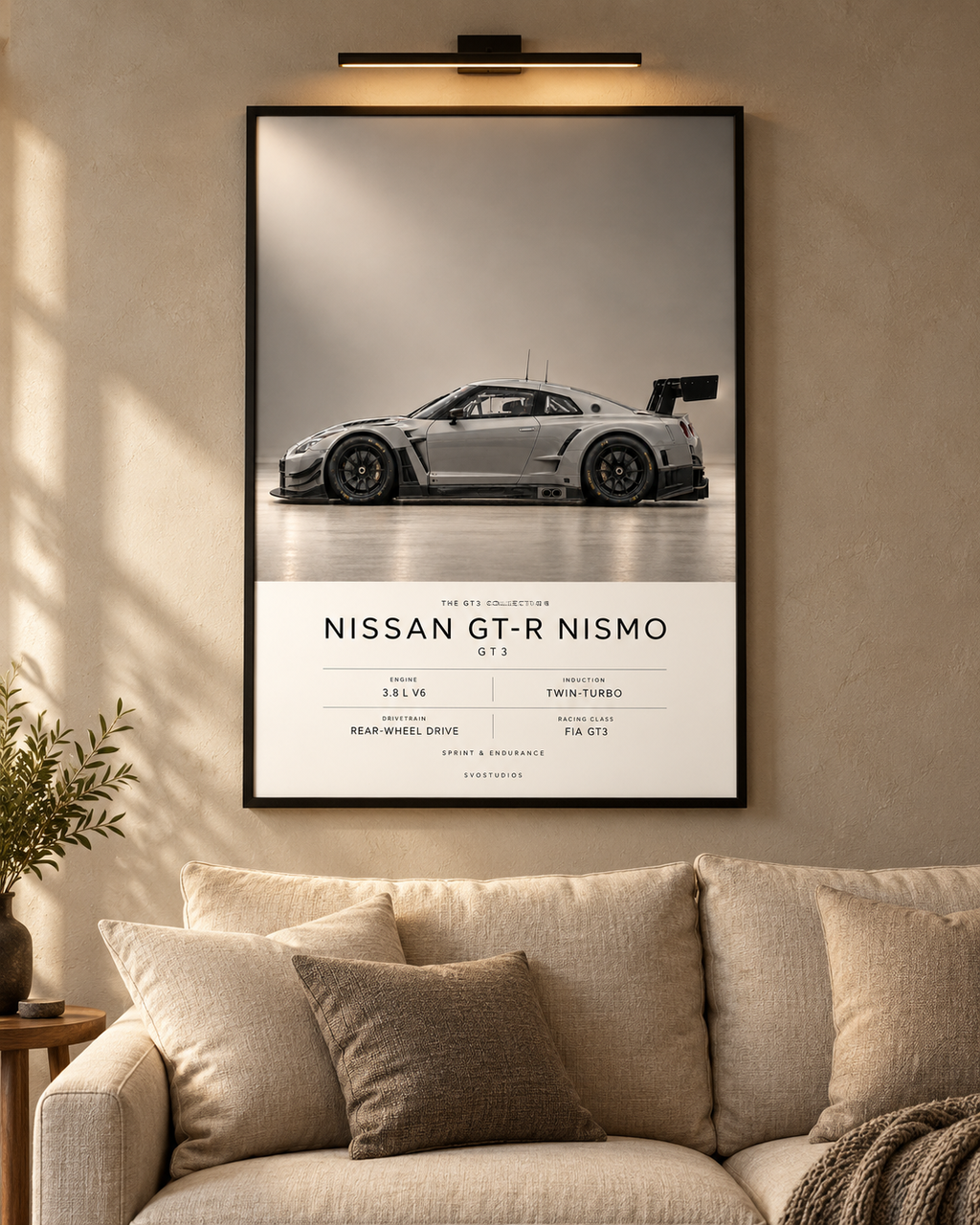 Nissan GT-R Nismo GT3 — GT3 Studio Edition in a black Classic frame above a neutral sofa with warm picture lighting